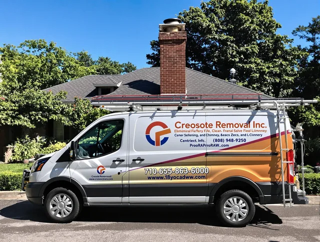 Hanson Chimney Sweep technician removing creosote safely in Hanson, MA